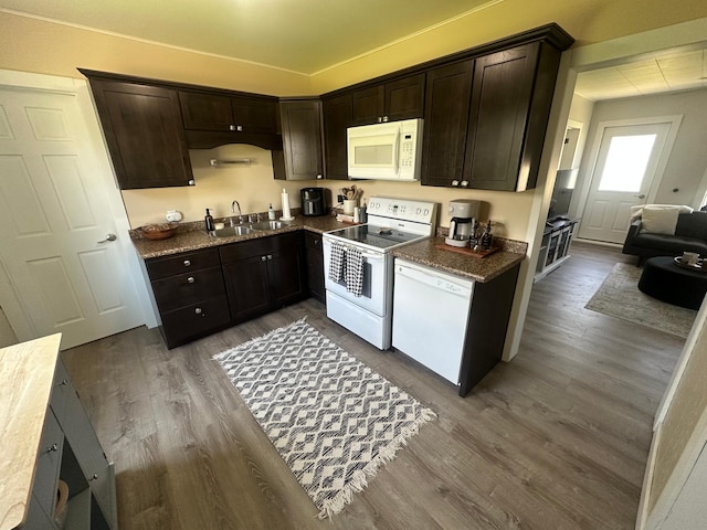502 1st Ave SW, Baudette, MN 56623 - kitchen with white appliances, dark brown cabinetry, and dark wood-style flooring