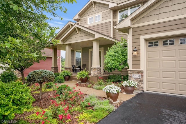 3631 Woodcrest Cir, Eagan, MN 55123 - property entrance with a porch and stone siding