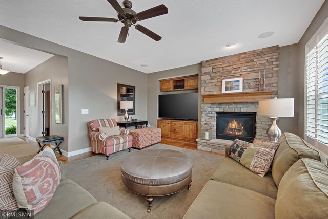 3631 Woodcrest Cir, Eagan, MN 55123 - living room with ceiling fan, wood finished floors, and plenty of natural light