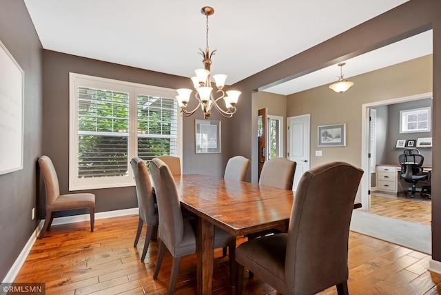 3631 Woodcrest Cir, Eagan, MN 55123 - dining space with a chandelier, light wood-style floors, and an office area