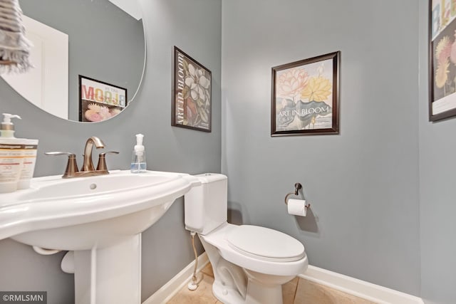 3631 Woodcrest Cir, Eagan, MN 55123 - bathroom with baseboards and tile patterned flooring