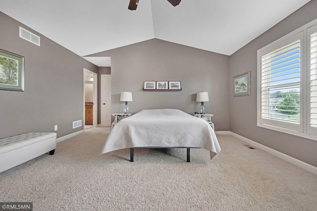 3631 Woodcrest Cir, Eagan, MN 55123 - carpeted bedroom with vaulted ceiling, a ceiling fan, and connected bathroom