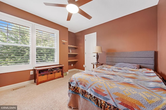 3631 Woodcrest Cir, Eagan, MN 55123 - carpeted bedroom with baseboards and ceiling fan