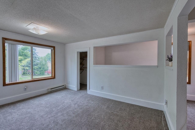 3026 5th Ave E, Hibbing, MN 55746 - unfurnished bedroom with a textured ceiling, carpet floors, a spacious closet, and a baseboard radiator