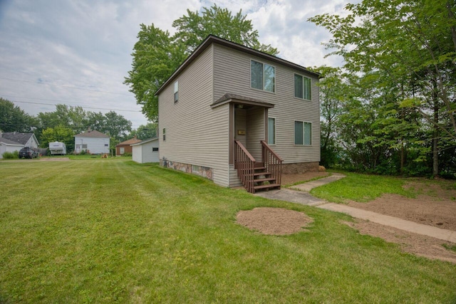 3026 5th Ave E, Hibbing, MN 55746 - view of front of house featuring a front lawn