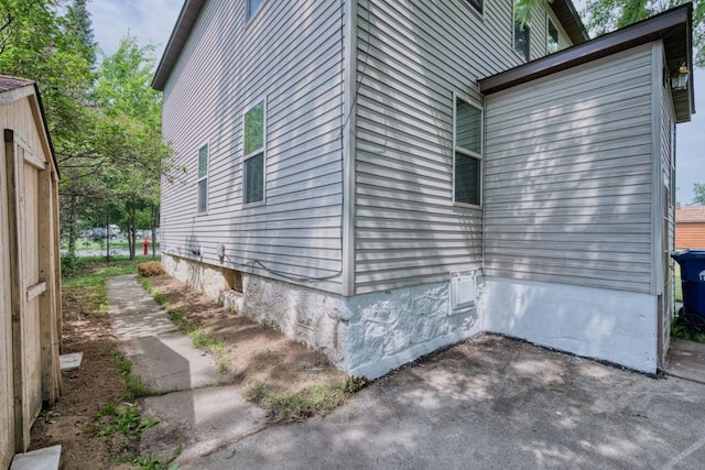 3026 5th Ave E, Hibbing, MN 55746 - view of home's exterior featuring a patio area