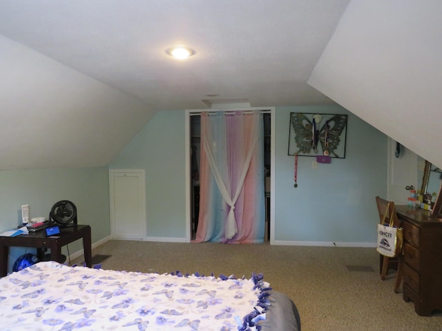 703 1st St SW, Wadena, MN 56482 - carpeted bedroom featuring vaulted ceiling and baseboards