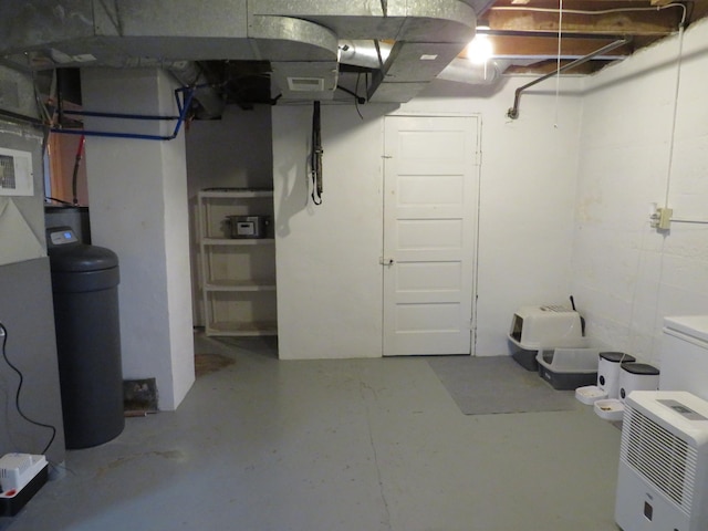 703 1st St SW, Wadena, MN 56482 - unfinished basement with a water softener system