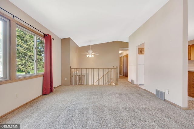 911 Lawnview Ave, Shoreview, MN 55126 - empty room featuring vaulted ceiling, carpet, and ceiling fan