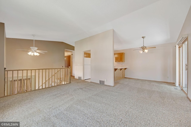 911 Lawnview Ave, Shoreview, MN 55126 - unfurnished room with lofted ceiling, ceiling fan, and light colored carpet