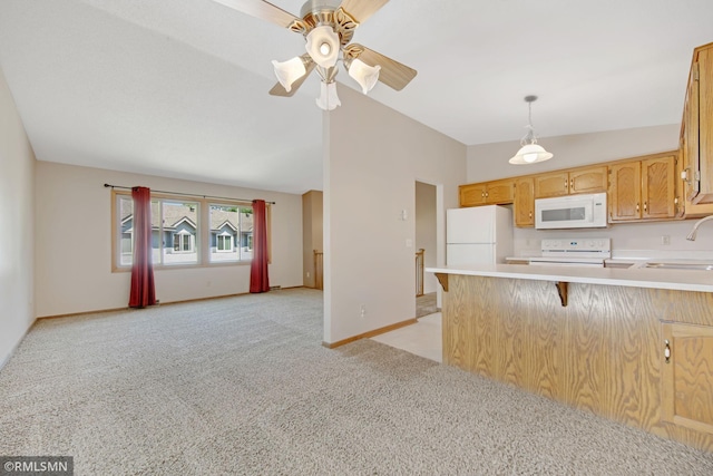 911 Lawnview Ave, Shoreview, MN 55126 - kitchen featuring lofted ceiling, light colored carpet, white appliances, light countertops, and a ceiling fan