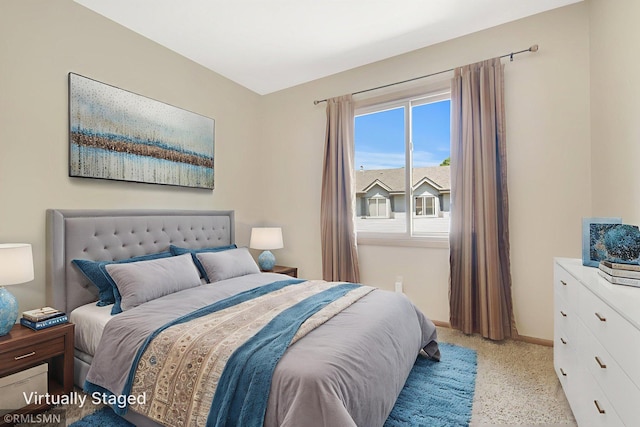 911 Lawnview Ave, Shoreview, MN 55126 - bedroom featuring baseboards and dark speckled floor