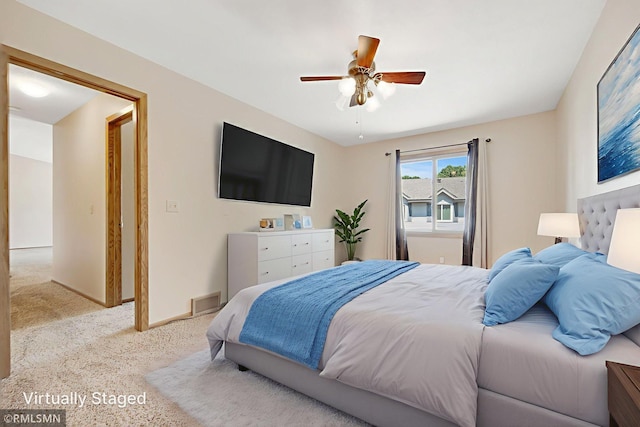 911 Lawnview Ave, Shoreview, MN 55126 - carpeted bedroom featuring a ceiling fan and baseboards