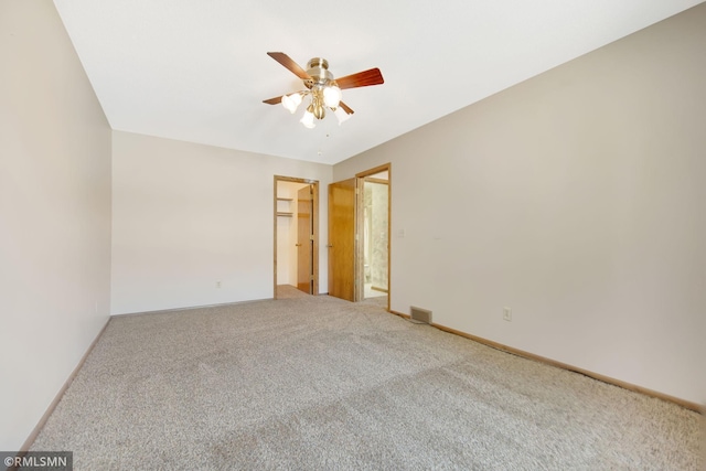 911 Lawnview Ave, Shoreview, MN 55126 - carpeted empty room featuring a ceiling fan and baseboards
