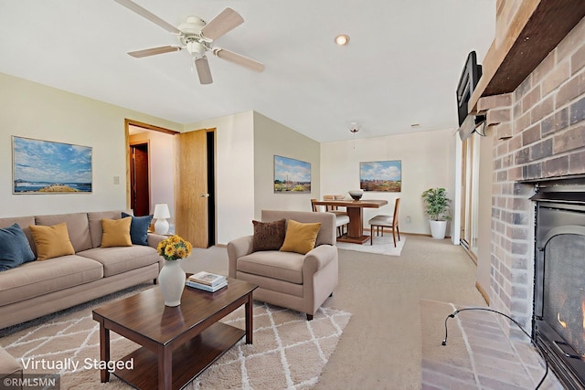 911 Lawnview Ave, Shoreview, MN 55126 - living area with a fireplace, a ceiling fan, and light carpet
