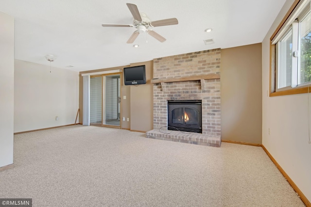 911 Lawnview Ave, Shoreview, MN 55126 - unfurnished living room featuring carpet, a ceiling fan, and a fireplace