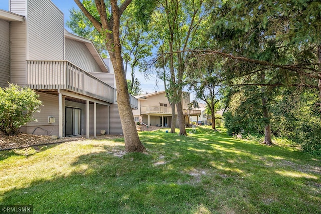 911 Lawnview Ave, Shoreview, MN 55126 - view of grassy yard with a deck