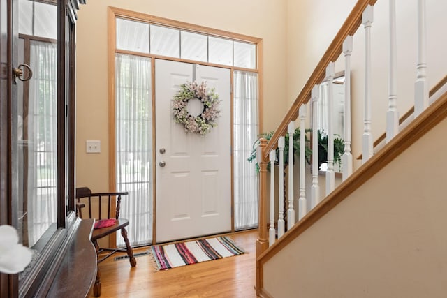 10931 185th Cir NW, Elk River, MN 55330 - foyer entrance featuring stairs and wood finished floors