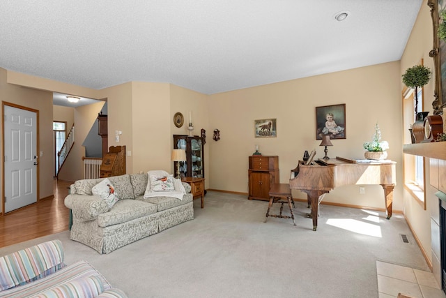 10931 185th Cir NW, Elk River, MN 55330 - living room featuring carpet flooring, stairs, and radiator