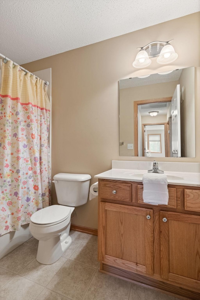 10931 185th Cir NW, Elk River, MN 55330 - bathroom with vanity, tile patterned flooring, a textured ceiling, and shower / bath combination with curtain