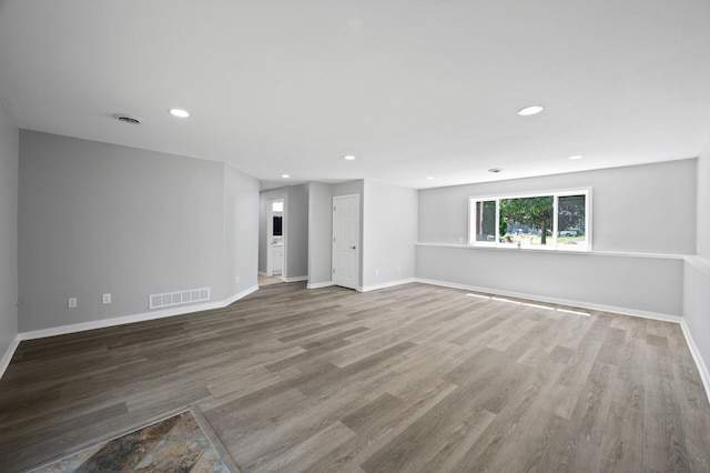 509 2nd St S, Montrose, MN 55363 - empty room featuring wood finished floors and recessed lighting