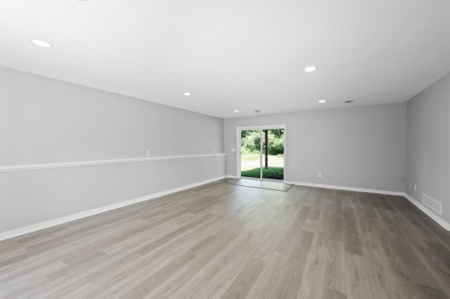 509 2nd St S, Montrose, MN 55363 - spare room with wood finished floors and recessed lighting
