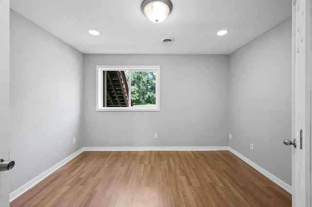 509 2nd St S, Montrose, MN 55363 - spare room featuring light wood-type flooring and recessed lighting