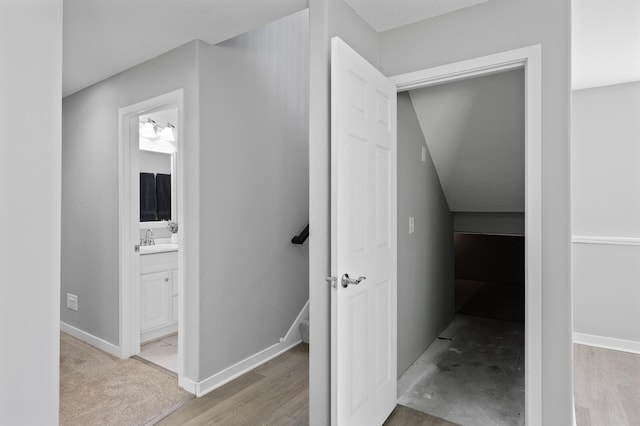 509 2nd St S, Montrose, MN 55363 - hallway featuring a sink and baseboards