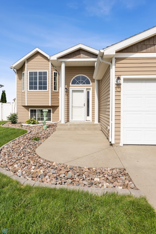 4416 10th St W, Fargo, ND 58078 - view of front of property with a garage and concrete driveway