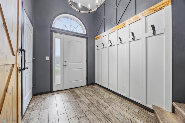 4416 10th St W, Fargo, ND 58078 - foyer with a chandelier and light wood-style flooring