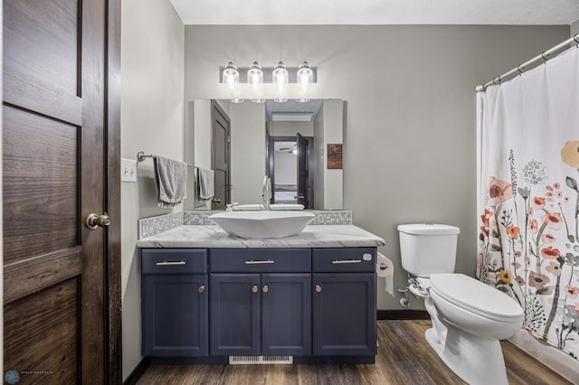 4416 10th St W, Fargo, ND 58078 - full bath with wood finished floors, vanity, and a shower with shower curtain