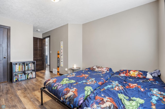 4416 10th St W, Fargo, ND 58078 - bedroom with wood finished floors