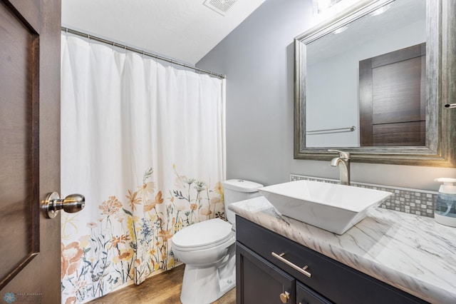 4416 10th St W, Fargo, ND 58078 - full bathroom with vanity and wood finished floors