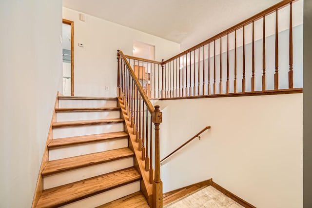 2208 84th Ave N, Brooklyn Park, MN 55444 - staircase featuring baseboards
