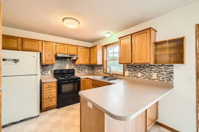 2208 84th Ave N, Brooklyn Park, MN 55444 - kitchen with freestanding refrigerator, black electric range, a peninsula, light countertops, and light flooring