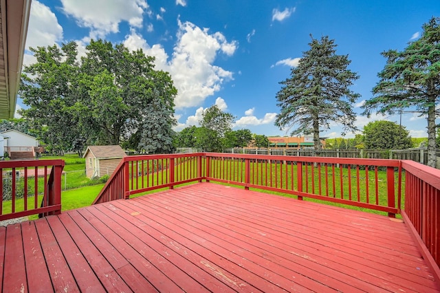 2208 84th Ave N, Brooklyn Park, MN 55444 - wooden deck featuring a fenced backyard and a shed