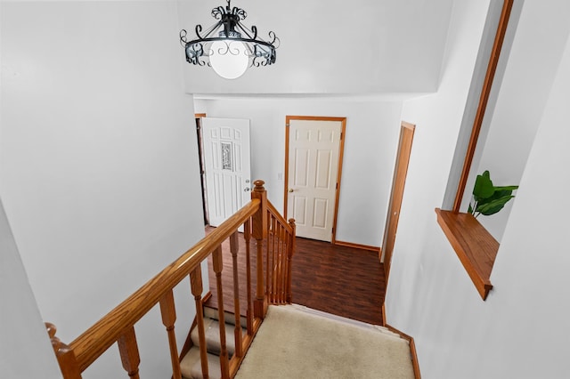 5833 Perry Ave N, Crystal, MN 55429 - staircase featuring wood finished floors and baseboard heating