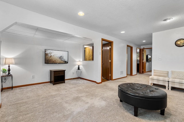 5833 Perry Ave N, Crystal, MN 55429 - sitting room with carpet, recessed lighting, and a textured ceiling