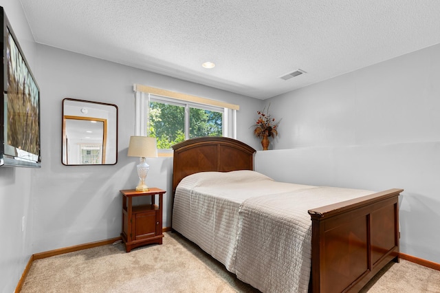 5833 Perry Ave N, Crystal, MN 55429 - bedroom featuring light carpet, a textured ceiling, and recessed lighting