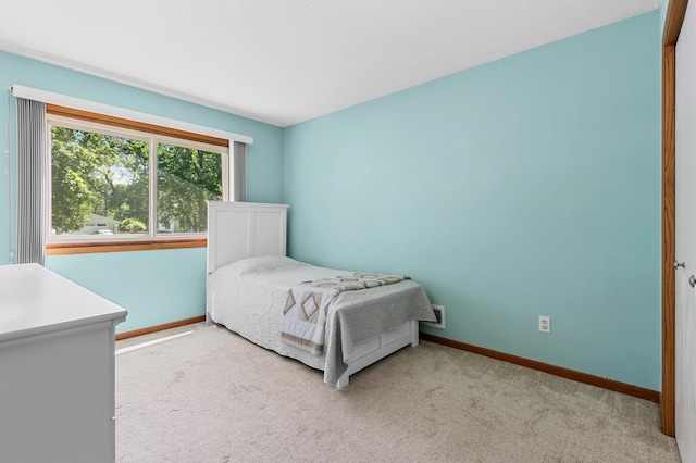 5833 Perry Ave N, Crystal, MN 55429 - carpeted bedroom with baseboards