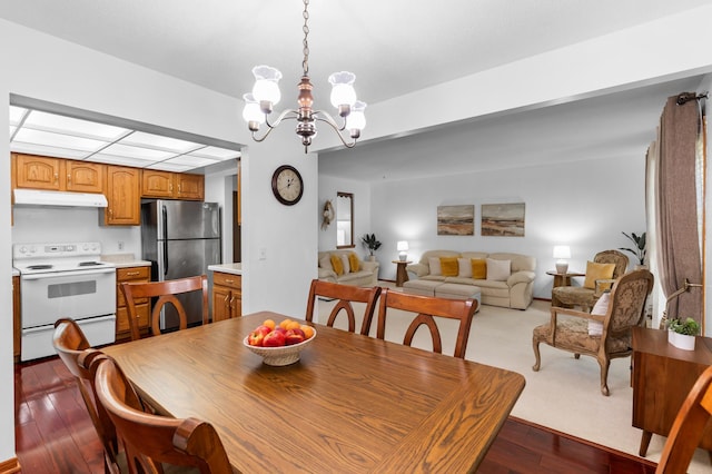 5833 Perry Ave N, Crystal, MN 55429 - dining area with a chandelier and hardwood / wood-style flooring