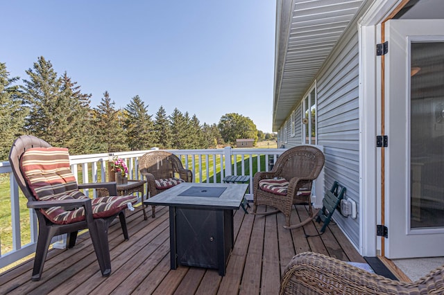 913 Anderson Way, Alexandria, MN 56308 - wooden terrace with an outdoor fire pit