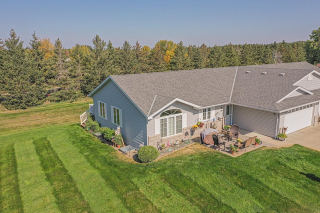 913 Anderson Way, Alexandria, MN 56308 - view of front of house with a shingled roof, an attached garage, a front yard, and driveway