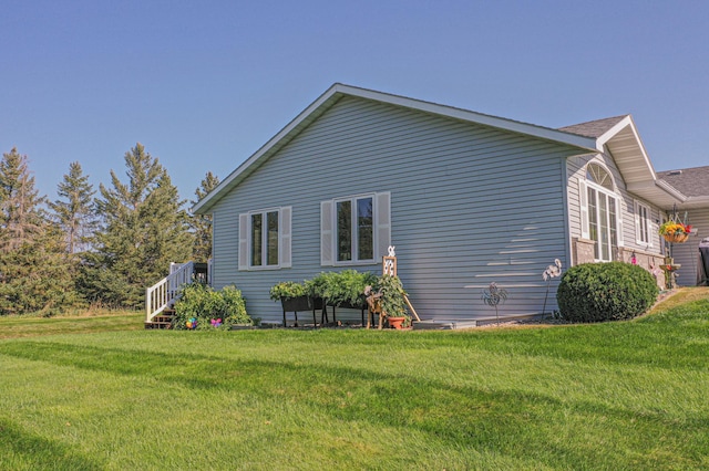 913 Anderson Way, Alexandria, MN 56308 - view of side of home with a yard