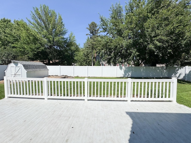 422 Galena St, Worthington, MN 56187 - wooden deck with a shed and a fenced backyard