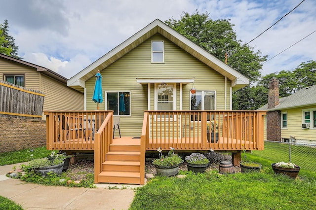 1076 Wilson Ave, Saint Paul, MN 55106 - rear view of property featuring a deck and cooling unit