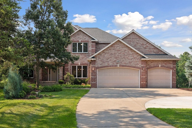 4301 Overlook Dr, Bloomington, MN 55437 - view of front of house with driveway, brick siding, an attached garage, and a front lawn