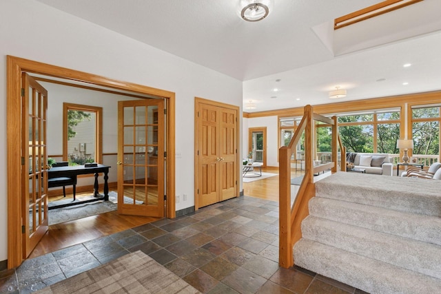 4301 Overlook Dr, Bloomington, MN 55437 - entrance foyer featuring stone tile floors, french doors, recessed lighting, and stairs