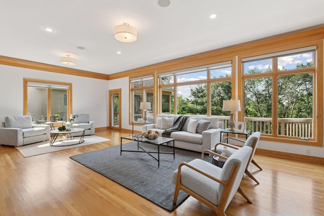 4301 Overlook Dr, Bloomington, MN 55437 - living room with plenty of natural light, wood finished floors, crown molding, and recessed lighting