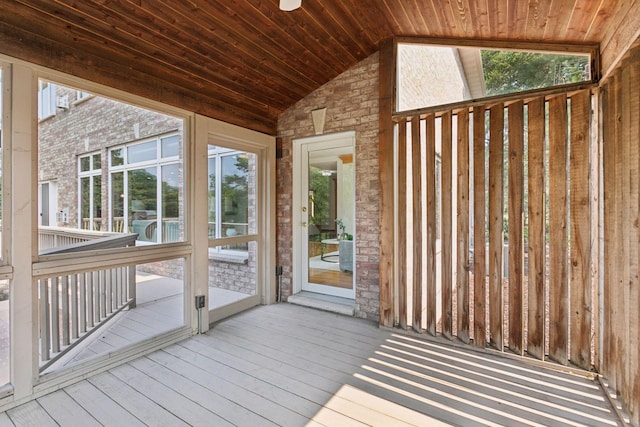 4301 Overlook Dr, Bloomington, MN 55437 - unfurnished sunroom featuring vaulted ceiling